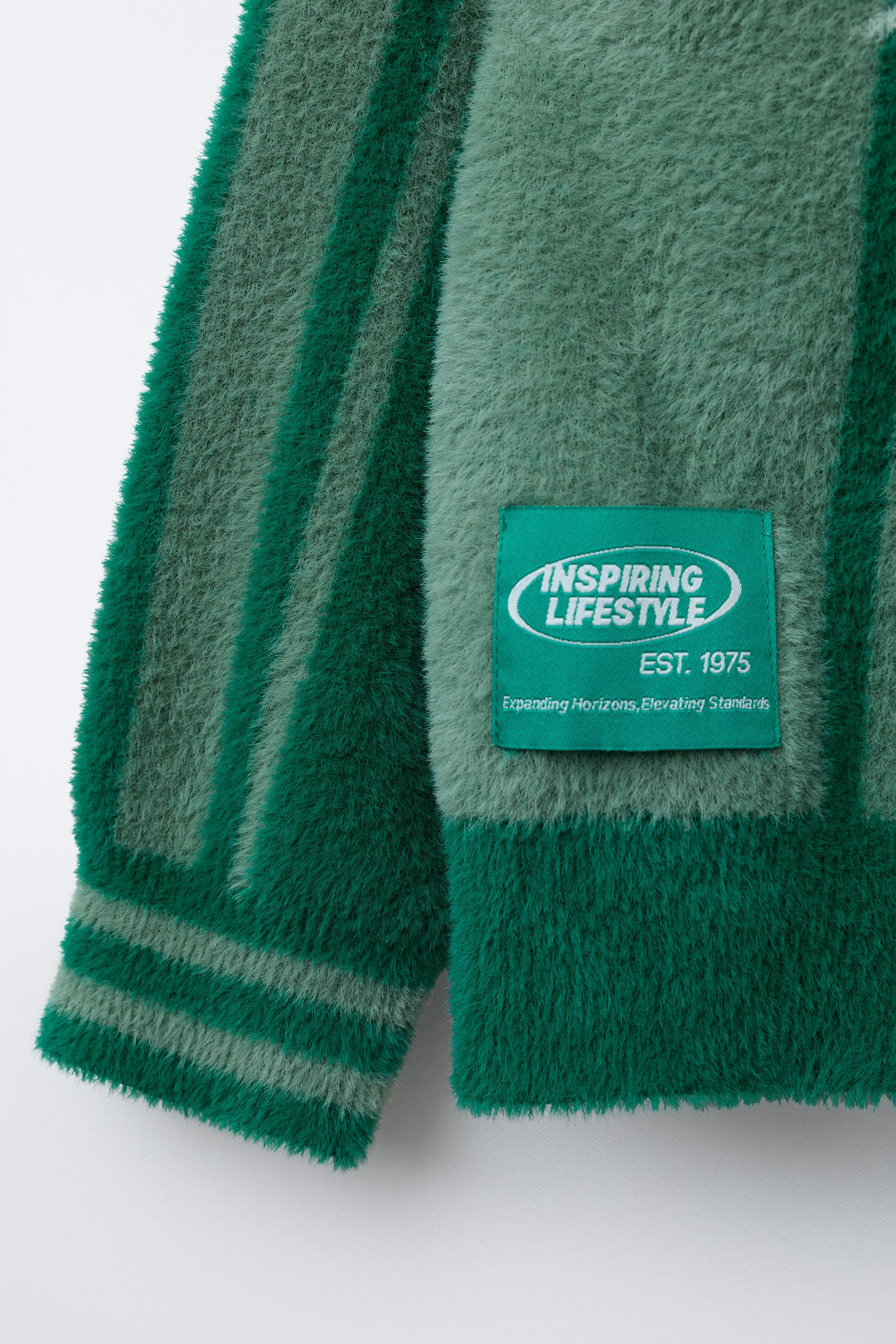 FAUX FUR KNIT POLO SWEATER WITH TEXT